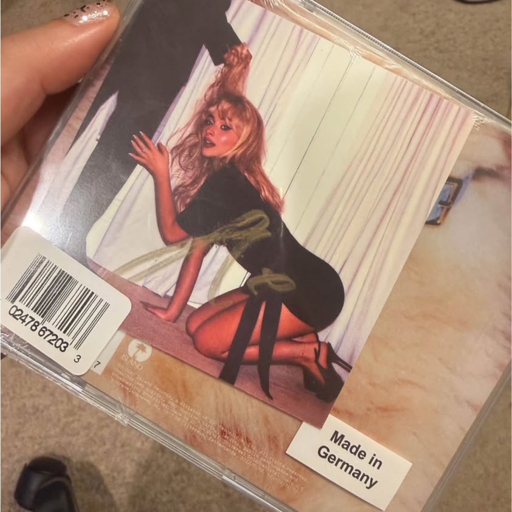 Signed Sabrina Carpenter Man’s best friend CD